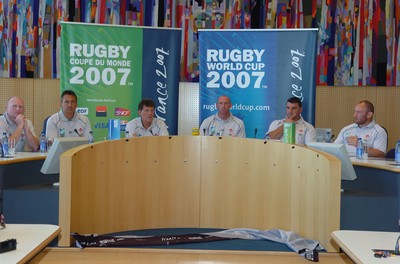 05.09.07 - Wales Rugby World Cup Training - France - (l-r)Neil Jenkins(kicking coach), Nigel Davies(attack coach), Gareth Jenkins(Head Coach), Gareth Thomas(Captain), Rowland Phillips(defence coach) and Robin Mcbryde(forwards coach) field questions during a press conference at City Hall in St Nazaire, France 