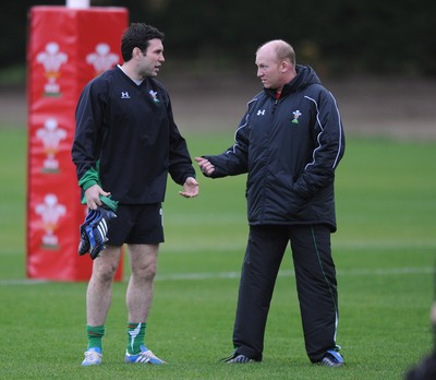 24.11.09 - Wales Rugby Training - Stephen Jones talks to Neil Jenkins during training. 