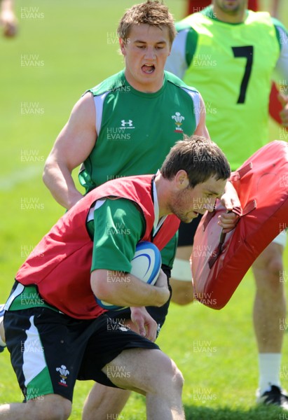 26.05.09 - Wales Rugby Training - Andrew Bishop tries to get past Jonathan Davies during training. 