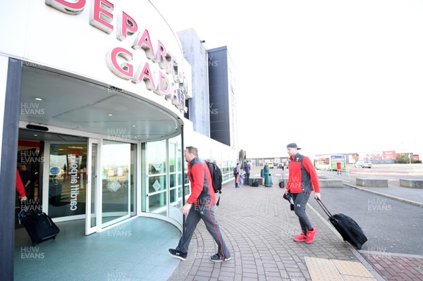 060220 - Wales Rugby Team Travel to Dublin - Wales assistant coach Jonathan Humphreys and Hadleigh Parkes arrive at Cardiff Airport