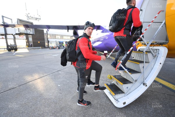060220 - Wales Rugby Team Travel to Dublin - Justin Tipuric boards the plane at Cardiff Airport
