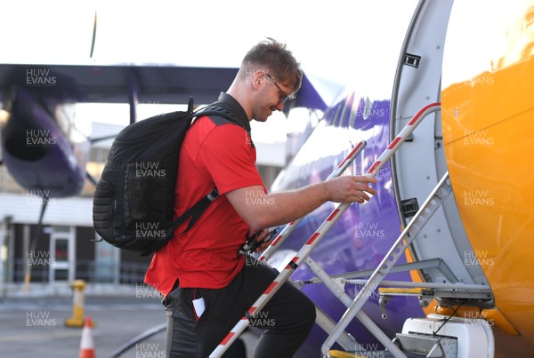 060220 - Wales Rugby Team Travel to Dublin - Aaron Wainwright boards the plane at Cardiff Airport