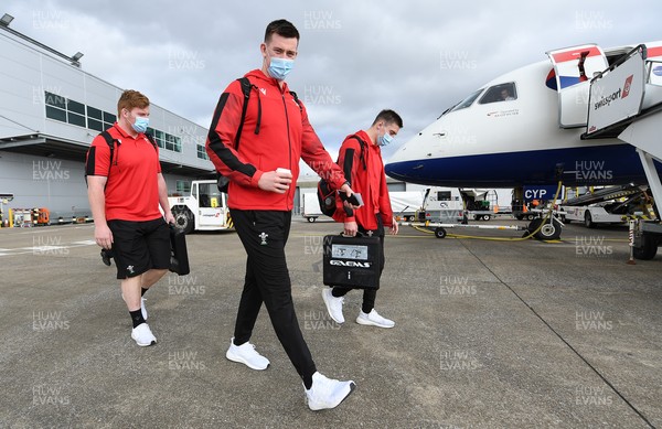 190321 - Wales Rugby team travel from Cardiff Airport to Paris ahead of their final Guinness 6 Nations match against France tomorrow - Adam Beard boards the plane