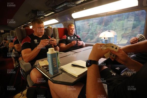 220923 - The Welsh Rugby travel on the train to Lyon for their match against Australia - Jac Morgan and Dewi Lake