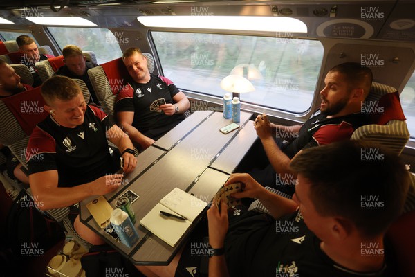 220923 - The Welsh Rugby travel on the train to Lyon for their match against Australia - Jac Morgan, Dewi Lake, Nicky Smith and Adam Beard