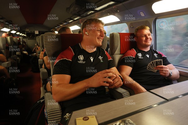 220923 - The Welsh Rugby travel on the train to Lyon for their match against Australia - Jac Morgan and Dewi Lake