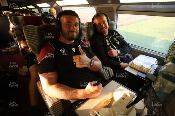 220923 - The Welsh Rugby travel on the train to Lyon for their match against Australia - Gareth Thomas and Tommy Reffell