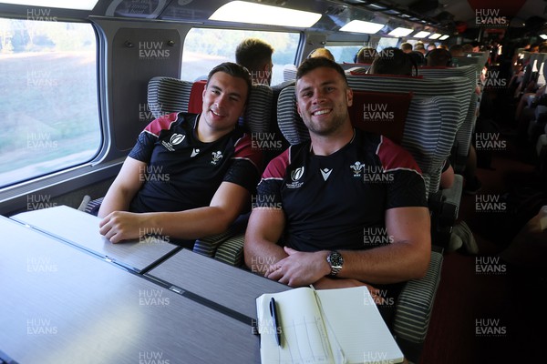 220923 - The Welsh Rugby travel on the train to Lyon for their match against Australia - Taine Basham and Mason Grady