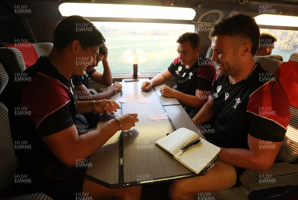 220923 - The Welsh Rugby travel on the train to Lyon for their match against Australia - Louis Rees-Zammit, Rio Dyer, Taine Basham and Mason Grady