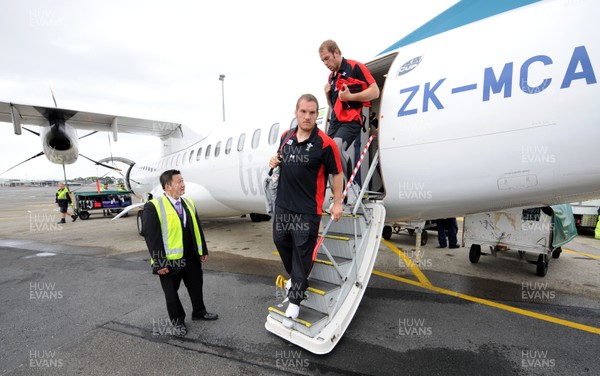 03.10.11 - Wales Rugby Team Travel to Wellington - Gethin Jenkins and Alun Wyn Jones leave the Wales team plane after arriving in Wellington. 