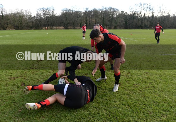 010222 - Wales Rugby Training - Louis Rees-Zammit, Gareth Williams, Owen Watkin and Johnny McNicholl during training