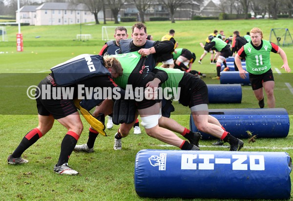 010222 - Wales Rugby Training - Ben Carter, Tomas Francis and Ryan Elias during training