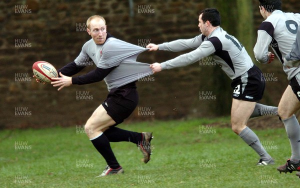 010205 - Wales Rugby Training - Wales' Tom Shanklin gets caught by Gareth Cooper during training today