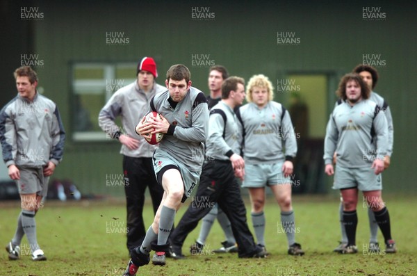 010206  Wales rugby training,Cardiff  Michael Owen picks up speed   