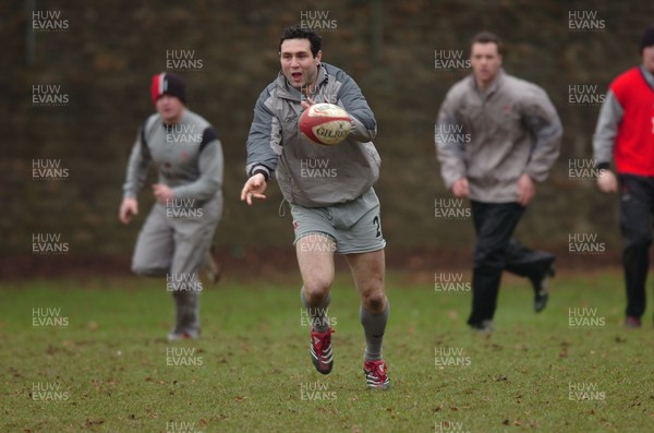 010206  Wales rugby training,Cardiff  Stephen Jones watched by Shane Williams and Mark Jones   