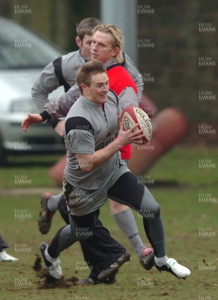 010206  Wales rugby training,Cardiff  Matthew Watkins goes past Alix Popham   