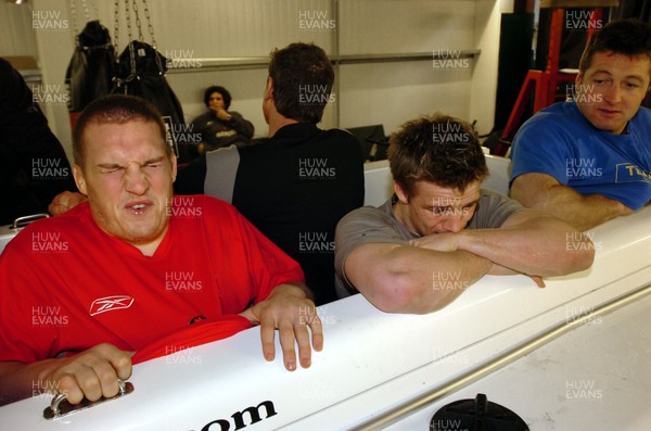 010206  Wales rugby training,Cardiff  L-r Gethin Jenkins, Dwayne Peel and Ian Gough go through the pain barrier as they are immersed in the Equine Spa at their traing HQ near Cardiff   