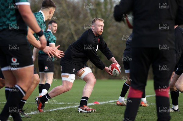 010224 - Wales Rugby Training in the week leading up to their first 6 Nations game against Scotland - Tommy Reffell during training