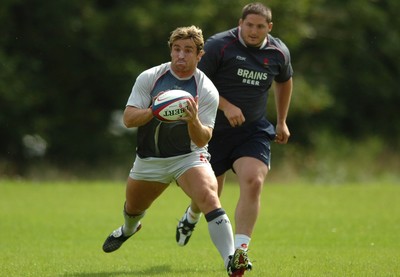 01.08.07 - Wales Rugby Training - Huw Bennett takes a pass during training 