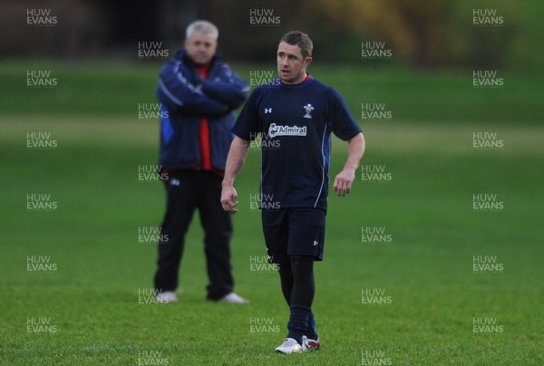 01.12.11 - Wales Rugby Training - Shane Williams  and head coach Warren Gatland look on during training. 