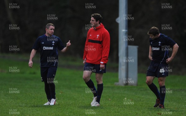 01.12.11 - Wales Rugby Training - Shane Williams talks to Alex Cuthbert and Leigh Halfpenny during training. 