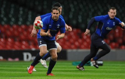 02.02.11 - Wales Rugby Training - Lee Byrne looks on during training. 