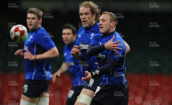 02.02.11 - Wales Rugby Training - Morgan Stoddart looks on during training. 