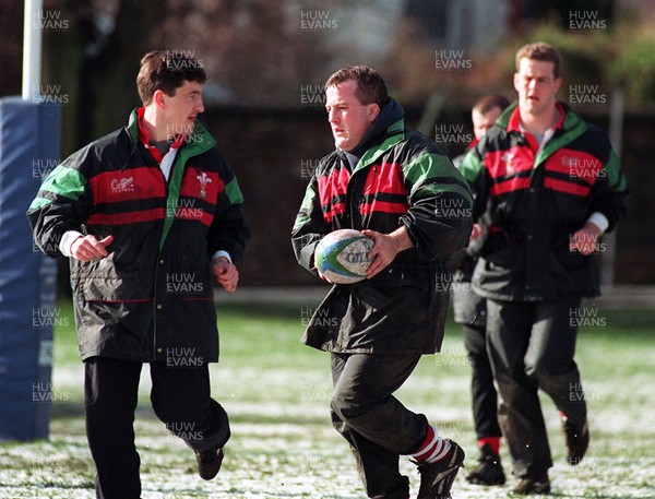 020395 - Wales Rugby Training - Robert Jones (left) and Garin Jenkins (centre) during training