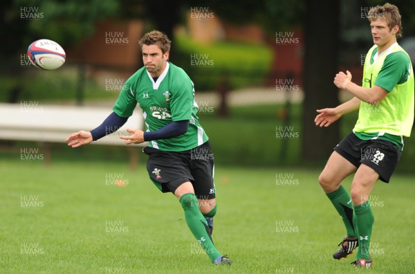 02.06.09 - Wales Rugby Training - Nicky Robinson in action during training as Dan Biggar looks on. 