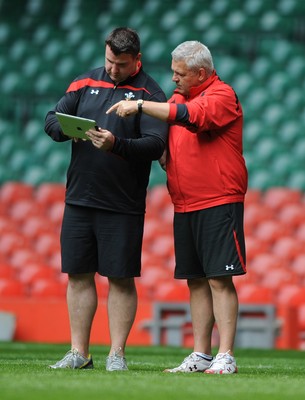 02.08.11 - Wales Rugby Training - Head coach Warren Gatland(R) and analyst Rhys Long look at an Ipad during training. 