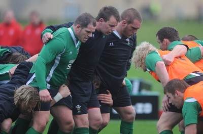 02.11.09 - Wales Rugby Training (L-R)Paul James, Matthew Rees and Gethin Jenkins pack down during training. 