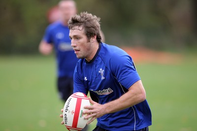 02.11.10. Wales Rugby Training... Andrew Bishop puts in a pass.. 