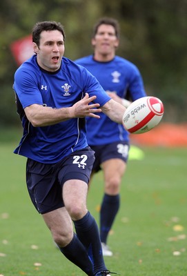 02.11.10. Wales Rugby Training... Stephen Jones puts in a pass.. 