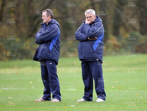 02.11.10. Wales Rugby Training... Warren Gatland(rt) and Rob Howley watch training.. 