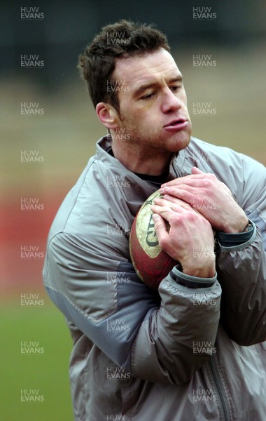 030206  Wales rugby training,Teddington -  Determination on the face of Mark Jones as he holds onto the ball  