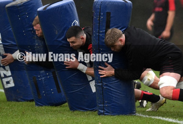 030222 - Wales Rugby Training - Ross Moriarty, Ellis Jenkins and Aaron Wainwright during training