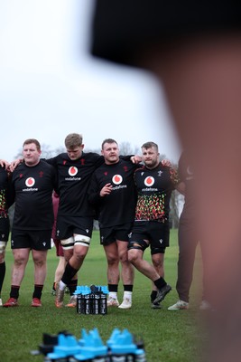 030226 - Wales Rugby Training - Dewi Lake speaks in the team huddle