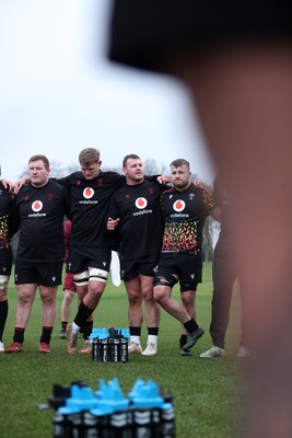 030226 - Wales Rugby Training - Dewi Lake speaks in the team huddle