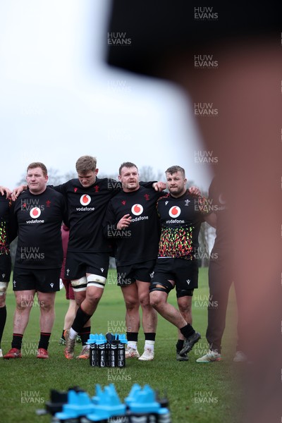 030226 - Wales Rugby Training - Dewi Lake speaks in the team huddle