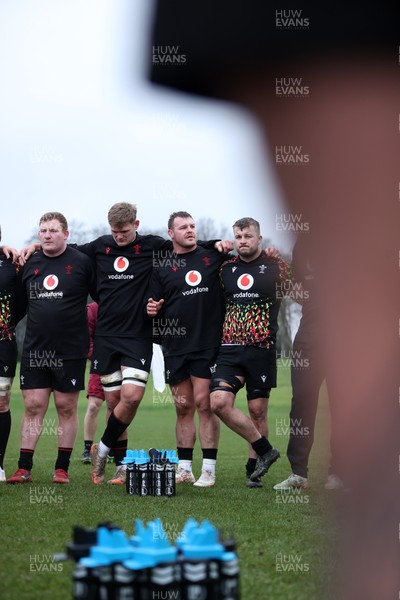 030226 - Wales Rugby Training - Dewi Lake speaks in the team huddle
