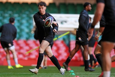 030325 - Wales Rugby Training at the Principality Stadium at the start of the week leading up to their 6 Nations game against Scotland - Tom Rogers during training