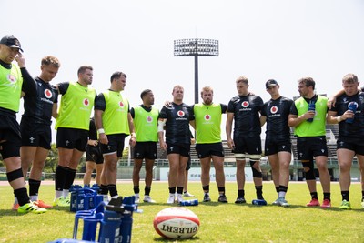 030725 - Wales Rugby Training ahead of their game against Japan on Saturday - Dewi Lake speaks in the team huddle