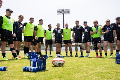030725 - Wales Rugby Training ahead of their game against Japan on Saturday - Dewi Lake speaks in the team huddle