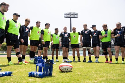 030725 - Wales Rugby Training ahead of their game against Japan on Saturday - Dewi Lake speaks in the team huddle