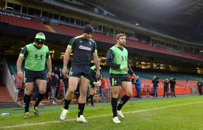 031114 - Wales Rugby Training -Emyr Phillips, Jamie Roberts and Leigh Halfpenny walk out onto the new pitch at the Millennium Stadium