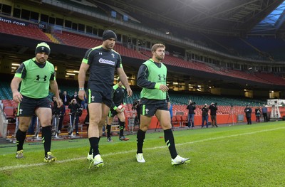 031114 - Wales Rugby Training -Emyr Phillips, Jamie Roberts and Leigh Halfpenny walk out onto the new pitch at the Millennium Stadium