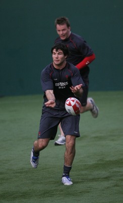 04.02.08 Wales Rugby Training,Cardiff... Mike Phillips watched by Matthew Rees. 