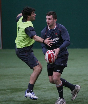 04.02.08 Wales Rugby Training,Cardiff Deiniol Jones takes on Mike Phillips. 