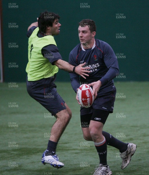 04.02.08 Wales Rugby Training,Cardiff Deiniol Jones takes on Mike Phillips. 