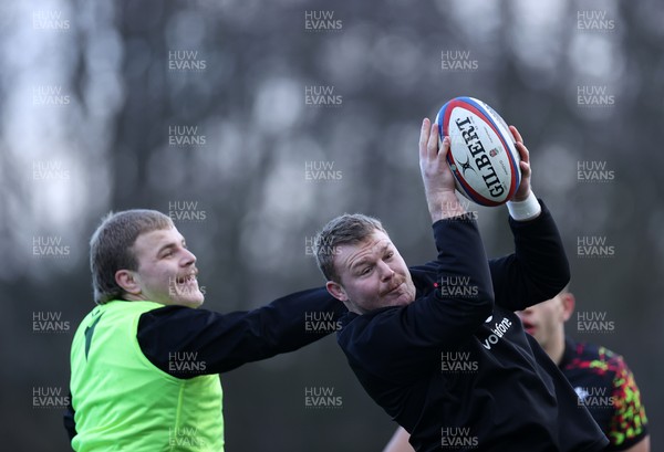 040226 - Wales Rugby Training ahead of their first Six Nations game against England - Archie Griffin and Dewi Lake during training